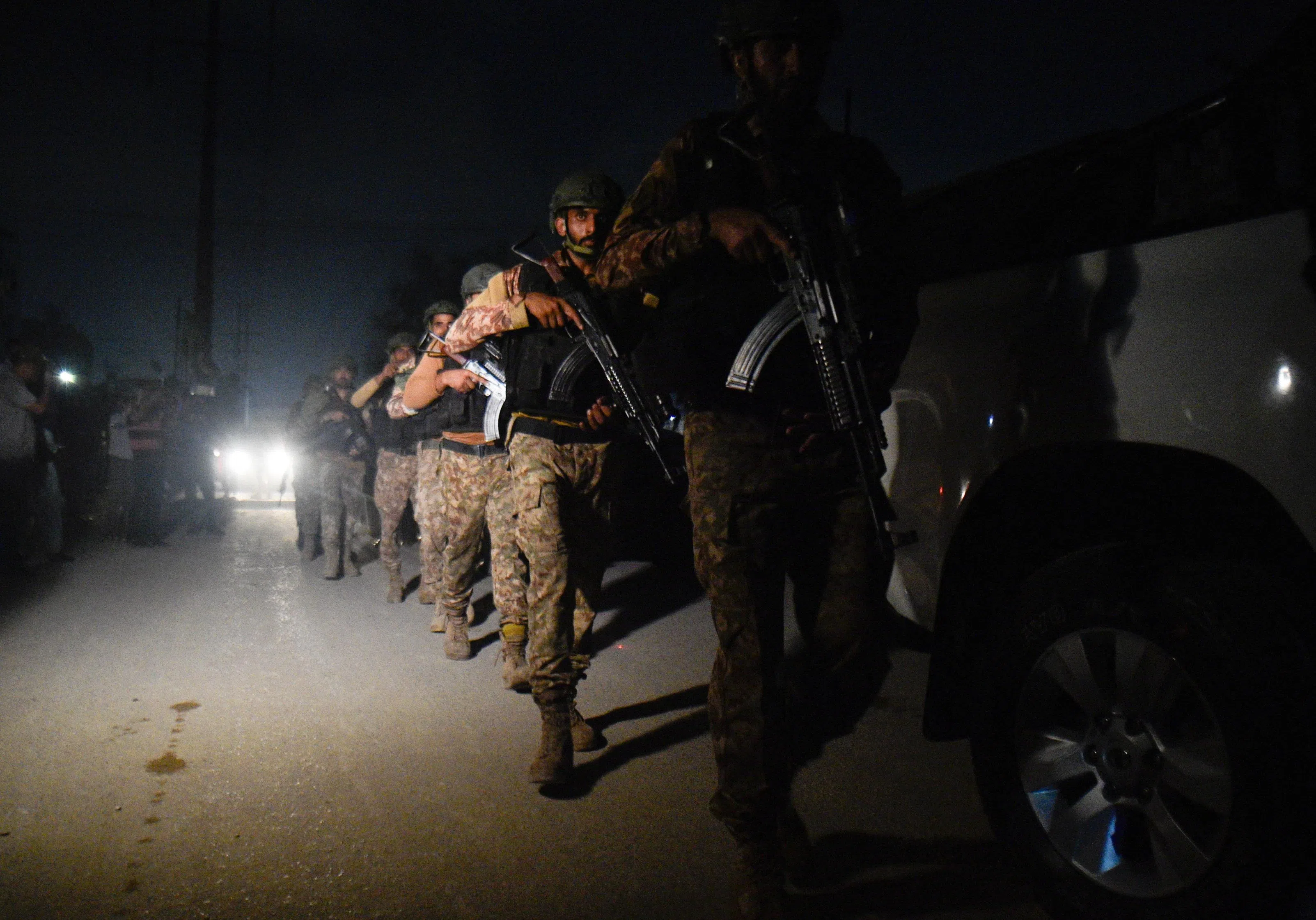 Security personnel patrols after an explosion and gunfire were reported, near offices of the Rangers, a paramilitary force, in Karachi, Pakistan, June 27, 2026. REUTERS/ Qaiser Khan