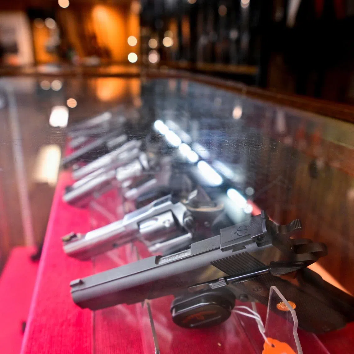 A display of handguns is seen at Wanstall's Hunting & Shooting after Canada's government introduced legislation to implement a \"national freeze\" on the sale and purchase of handguns, as part of a gun control package that would also limit magazine capacities and ban some toys that look like guns, in Maple Ridge, British Columbia, Canada May 31, 2022. REUTERS/Jennifer Gauthier