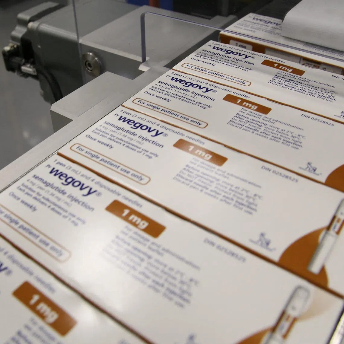 Boxes of Wegovy move along a packaging line at Novo Nordisk's facility in Hillerod, Denmark, March 8, 2024. REUTERS/ Tom Little