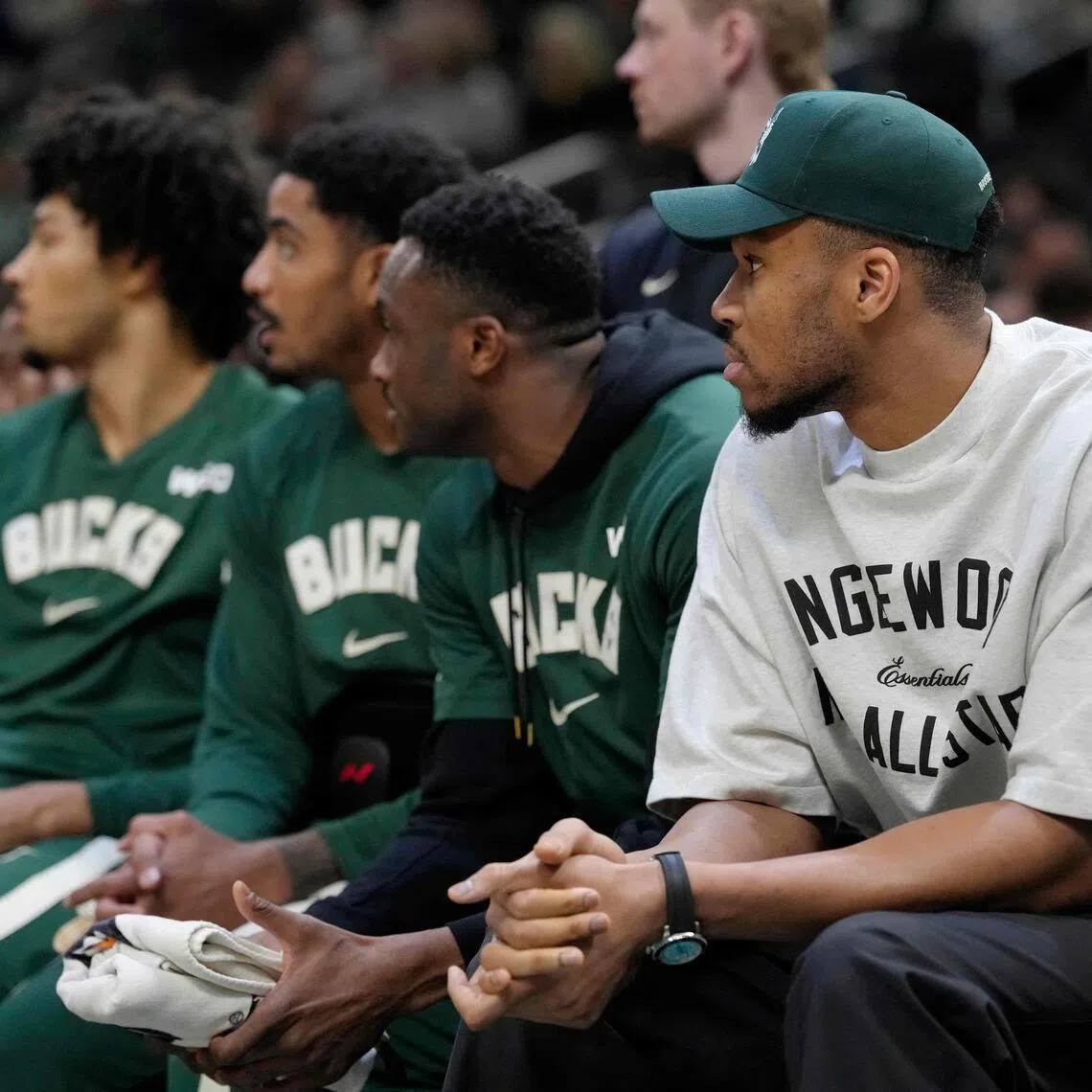 Giannis Antetokounmpo (right) of the Milwaukee Bucks sitting on the bench during the 133-101 NBA defeat by the Boston Celtics at Fiserv Forum on April 3, 2026 in Milwaukee, Wisconsin. 