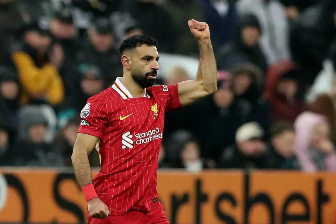 Liverpool's Mohamed Salah celebrates scoring their second goal against Newcastle. 