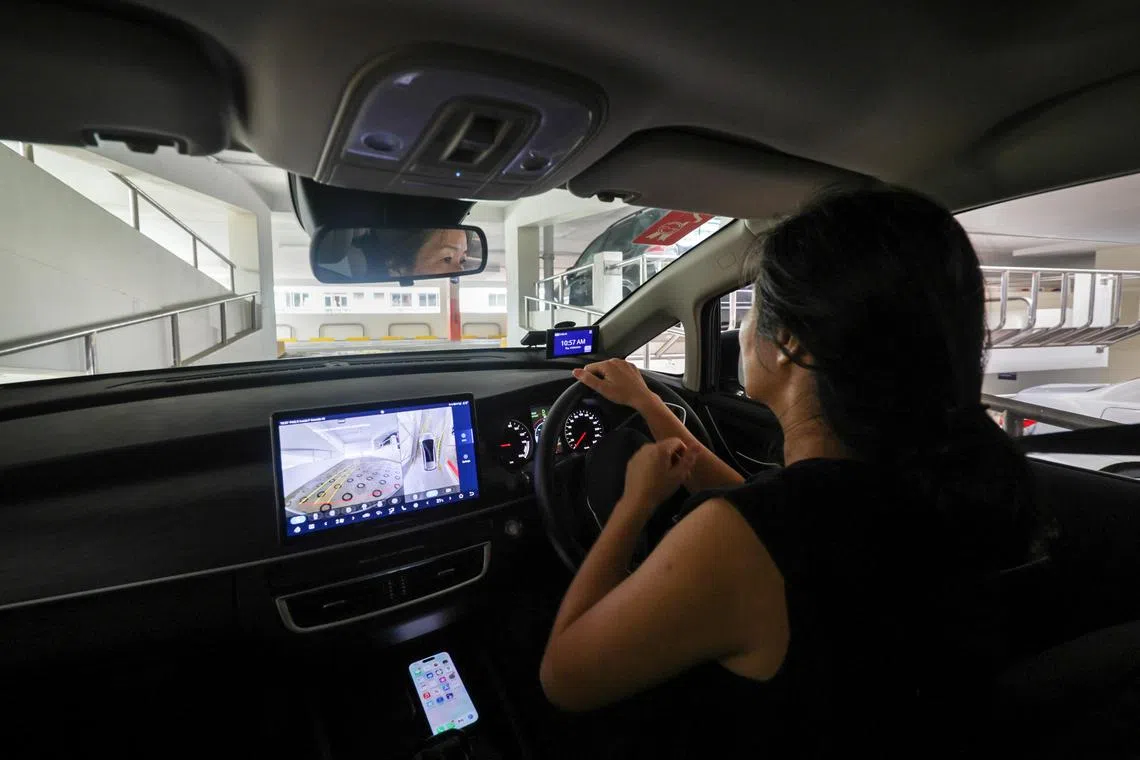 ST20250619_202598400293: Gin Tay / ycpark/ Tham Yuen-C/
The Straits Times senior political correspondent, Tham Yuen-C, navigating narrow carpark in a BYD M6 at Blk 505 Bishan St 11 HDB carpark on June 19, 2025.