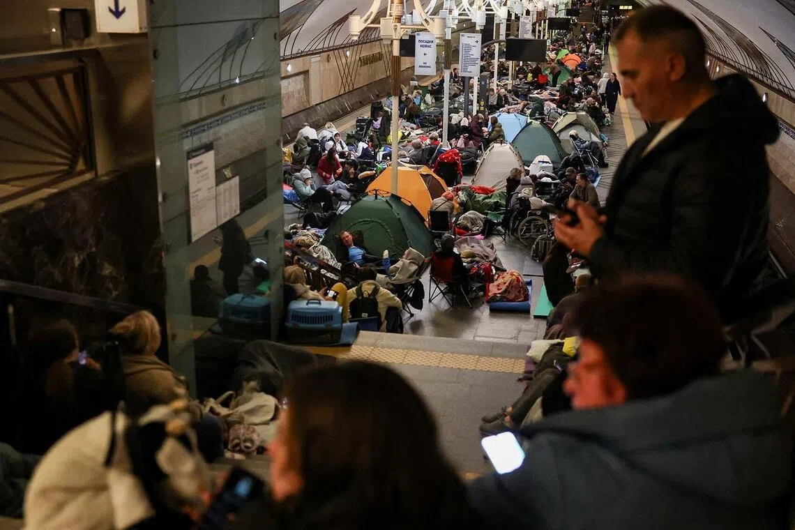 People taking shelter inside a metro station during a Russian air strike, amid Russia's attack on Ukraine, in Kyiv, Ukraine, June 2.