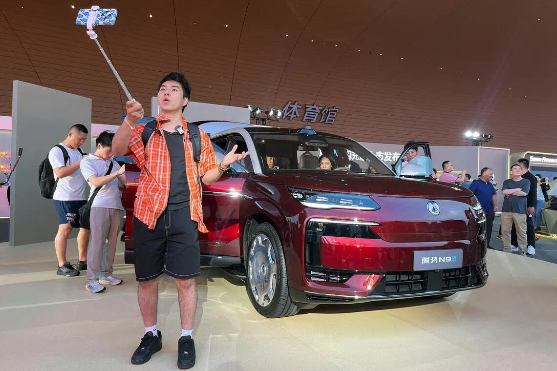 At Hong Kong auto show, China automakers target wealthy in right-hand-drive