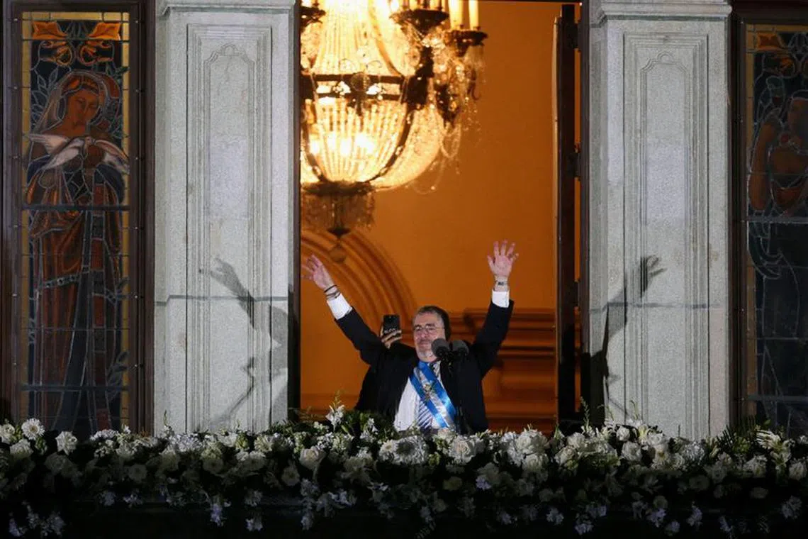 Guatemala's President Bernardo Arevalo gestures on the balcony of the National Palace in Guatemala City, Guatemala, January 15, 2024. REUTERS/Jose Cabezas