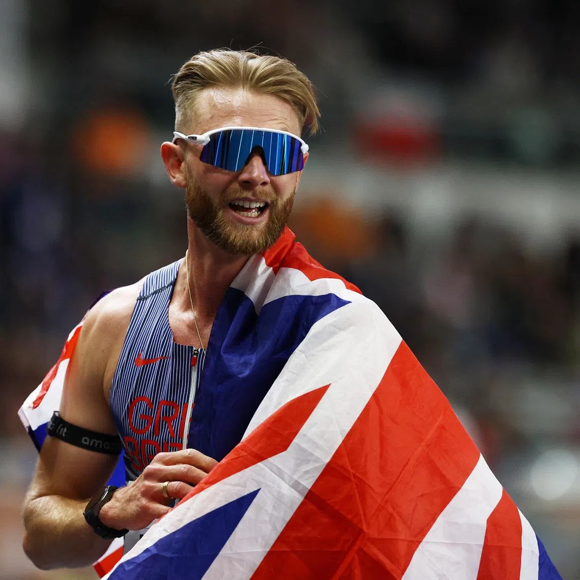 Athletics - World Indoor Championships - Kujawsko-Pomorska Arena, Torun, Poland - March 21, 2026 Britain's Josh Kerr celebrates winning the men's 3000m final REUTERS/Kacper Pempel