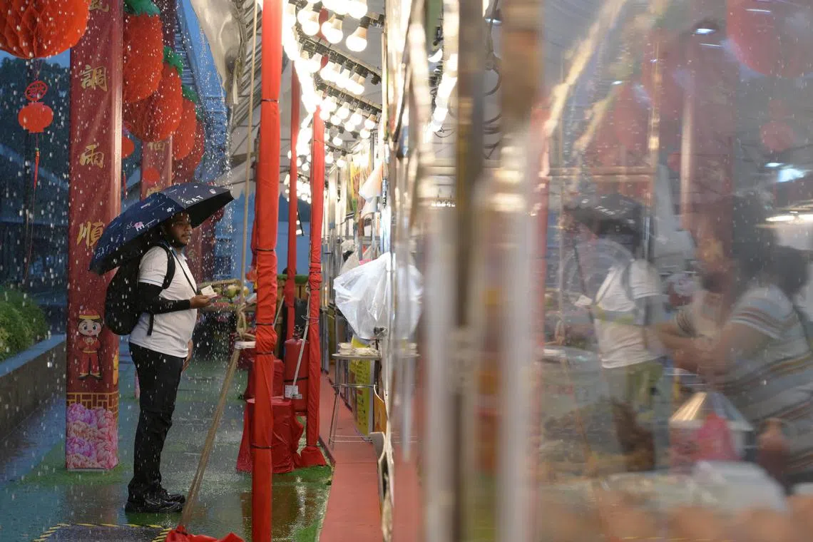 The Bukit Panjang Night Bazaar at Hillion Mall MRT Plaza saw a low turnout due to rainy weather on January 10, 2025.
