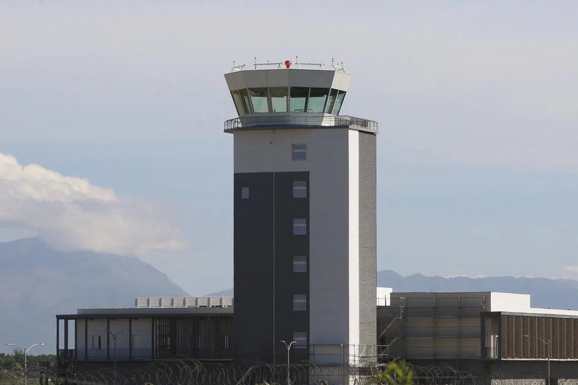 FILE PHOTO: An airport control tower is seen at Toussaint Louverture International Airport after the Federal Aviation Administration (FAA) said it will bar U.S. airlines from operating in Haiti for 30 days after three commercial jetliners were struck by gunfire on Monday, in Port-au-Prince, Haiti November 13, 2024. REUTERS/Marckinson Pierre/File Photo