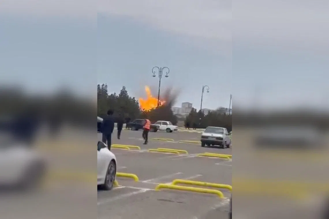 A drone explodes at the airport of Nakhchivan, Azerbaijan, in this screengrab obtained from a social media video released on March 5.