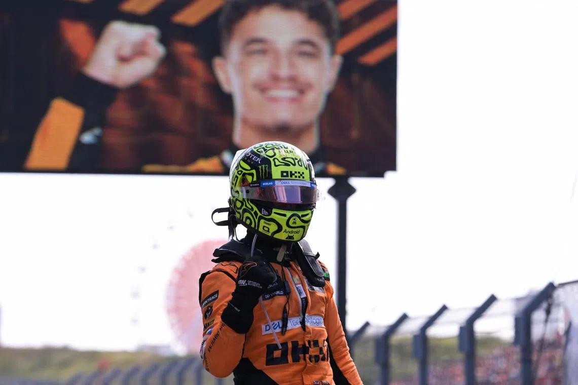McLaren's Lando Norris celebrating after winning the Formula One Dutch Grand Prix at The Circuit Zandvoort.