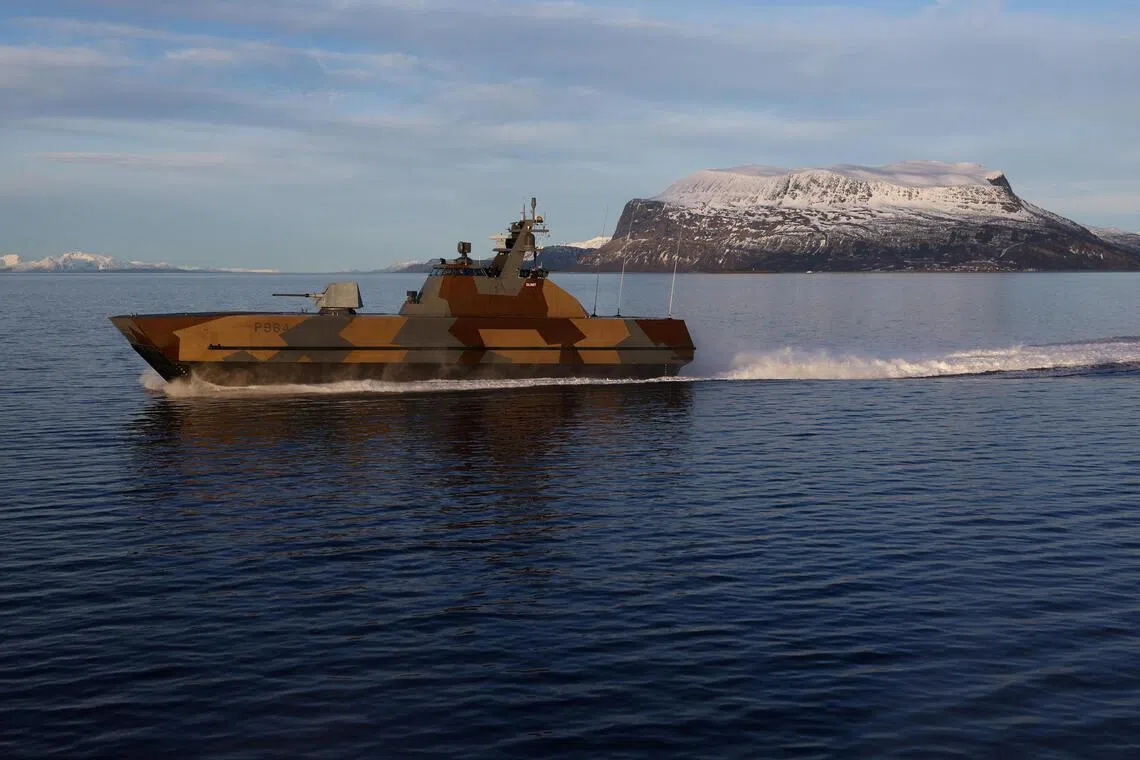 A Norwegian Coastal Corvette sails during the NATO Cold Response 2026 military exercise in the Ofotfjord in Arctic Norway.