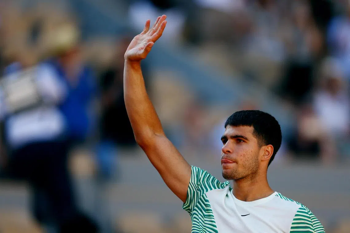 Spain's Carlos Alcaraz celebrates winning his second round match against Japan's Taro Daniel.