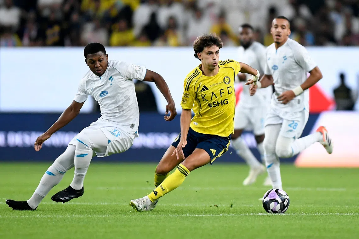 Soccer Football - Saudi Pro League - Al Nassr v Al Fateh - Al-Awwal Park, Riyadh, Saudi Arabia - October 18, 2025 Al Nassr's Joao Felix in action with Al Fateh's Zaydou Youssef REUTERS/Stringer