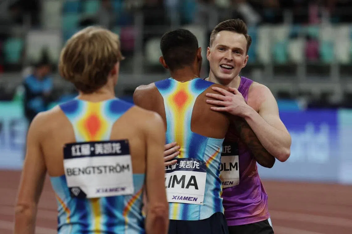 Athletics - Diamond League - Xiamen - Xiamen Egret Stadium, Xiamen, China - April 26, 2025 Norway's Karsten Warholm celebrates after setting a new world record in the men's 300m hurdles REUTERS/Go Nakamura