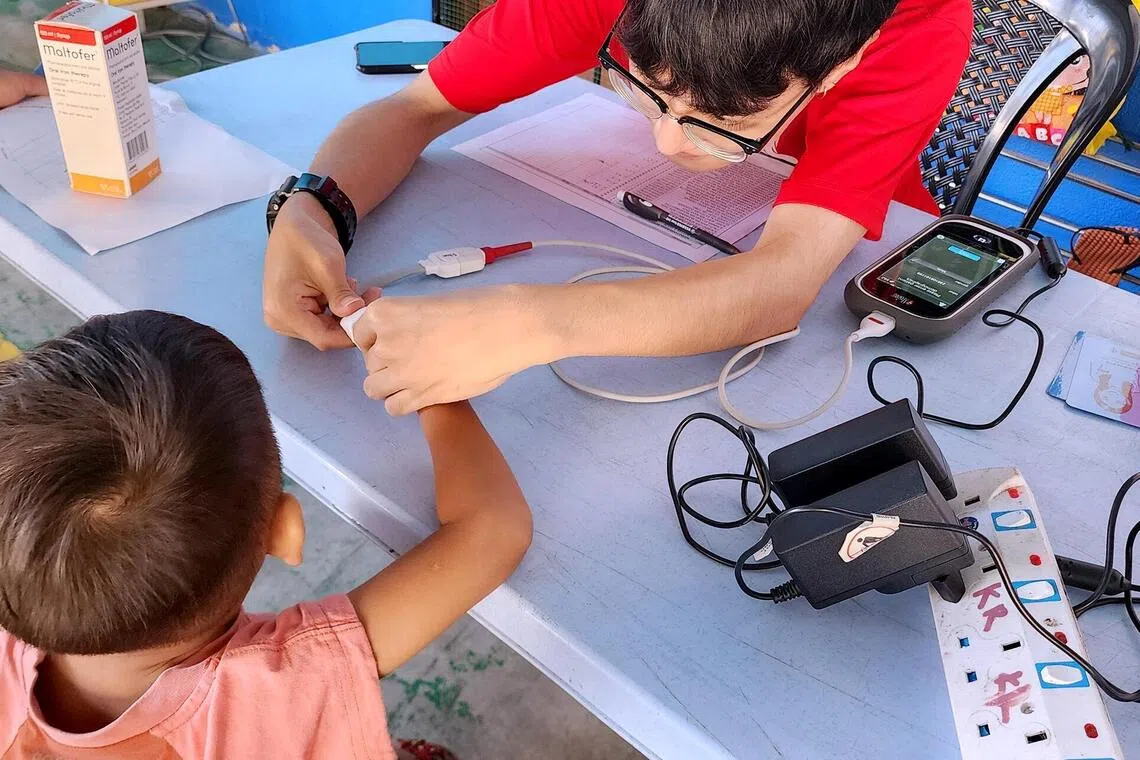 A child undergoes health checks at a stunting intervention programme in Puchong, Selangor.