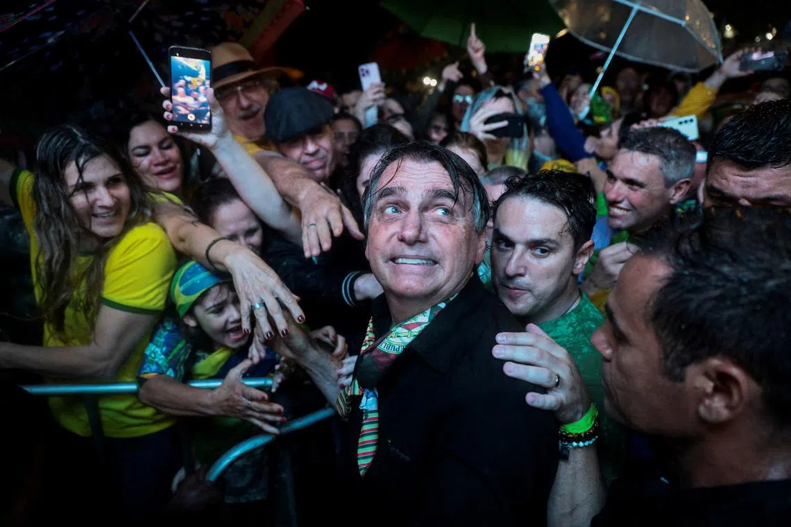 FILE PHOTO: Former Brazilian President Jair Bolsonaro meets with supporters, in Porto Alegre, Brazil, November 17, 2023. REUTERS/Diego Vara/File Photo