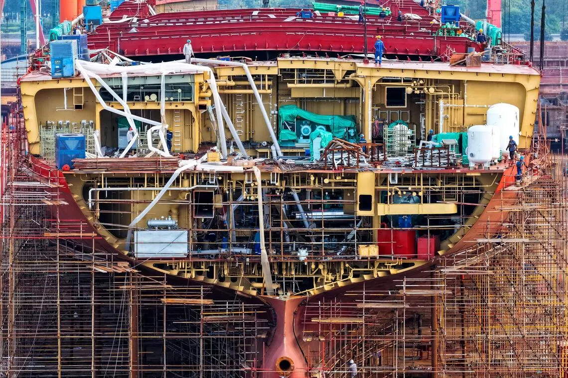 Workers building a vessel at a shipyard in Yizheng, Jiangsu province, China Aug 25, 2025.