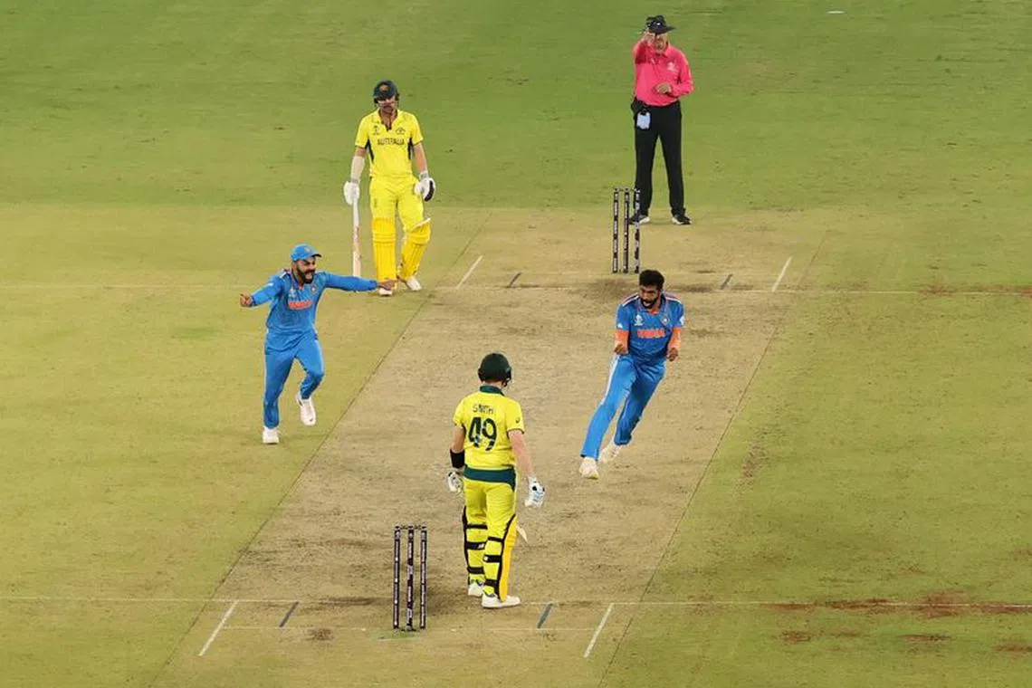 FILE PHOTO: Cricket - ICC Cricket World Cup 2023 - Final - India v Australia - Narendra Modi Stadium, Ahmedabad, India - November 19, 2023 India's Jasprit Bumrah celebrates after taking the wicket of Australia's Steve Smith REUTERS/Andrew Boyers/File Photo