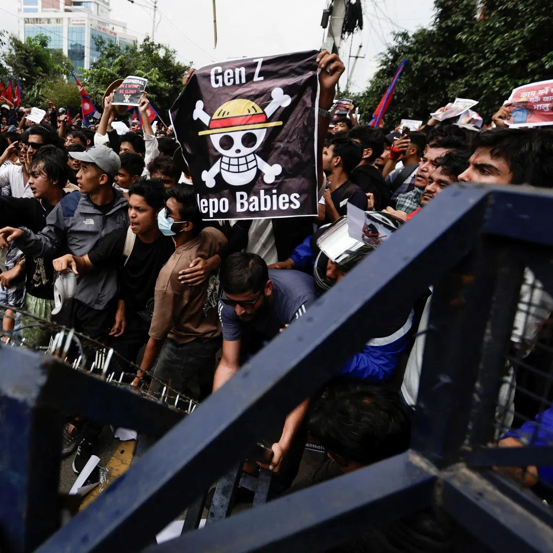 The cartoonish skull on a black banner has increasingly become a protest icon in parts of Asia.