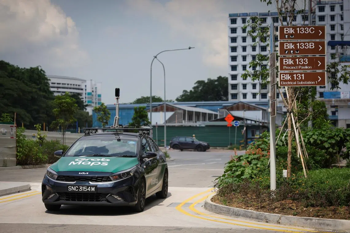 Grab's KartaCam 2 is mounted on the roof of a car to collect high-quality street-level imagery for map-making.