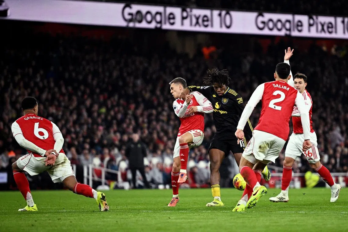 Soccer Football - Premier League - Arsenal v Manchester United - Emirates Stadium, London, Britain - January 25, 2026 Manchester United's Patrick Dorgu scores their second goal REUTERS/Dylan Martinez