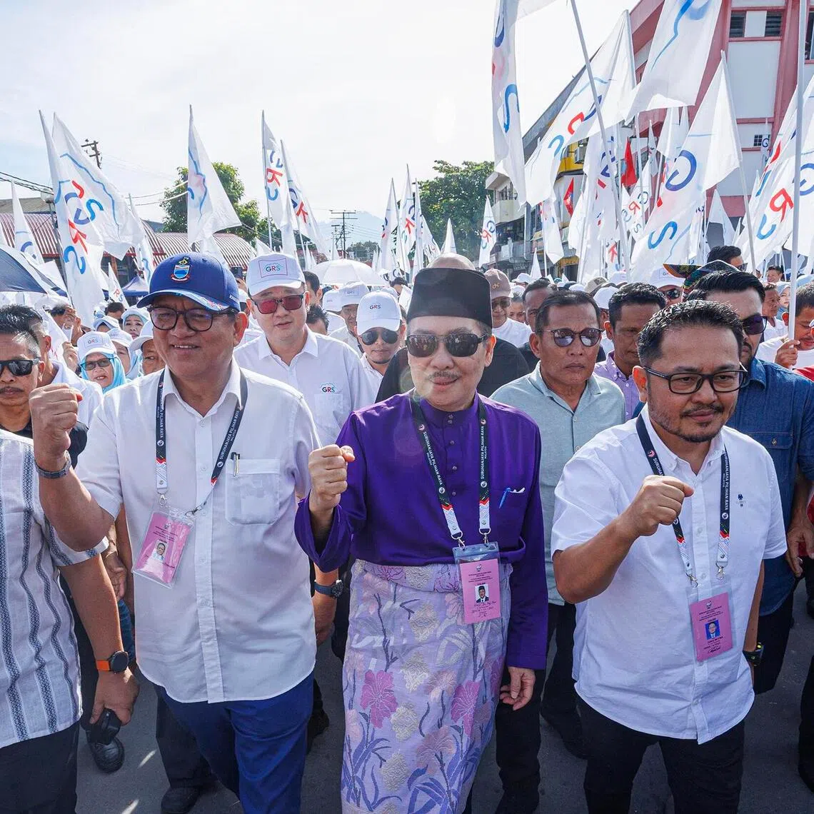 hzsabah - Sabah caretaker Chief Minister Hajiji Noor marching with party supporters to the nomination centre ahead of a crowded, dynasty-driven state election.

Credit: THE STAR/ANN