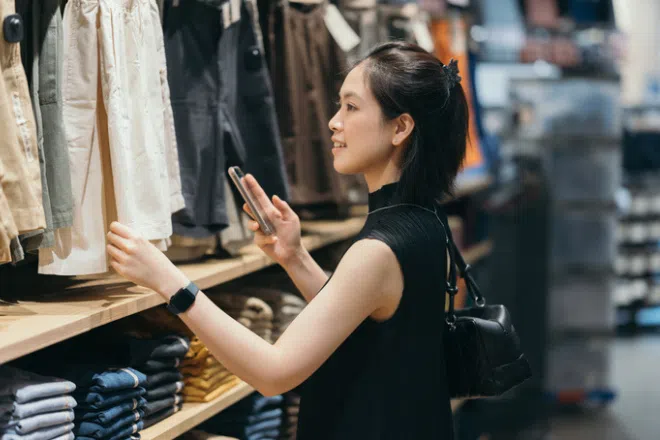 Woman shopping in a department store in Singapore