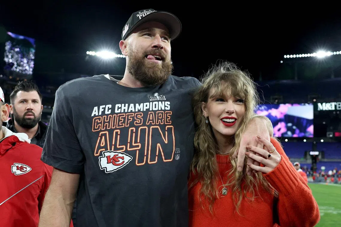 Travis Kelce of the Kansas City Chiefs celebrates with Taylor Swift after a 17-10 victory against the Baltimore Ravens in the AFC Championship Game at M&T Bank Stadium on Jan 28, 2024 in Baltimore, Maryland.   