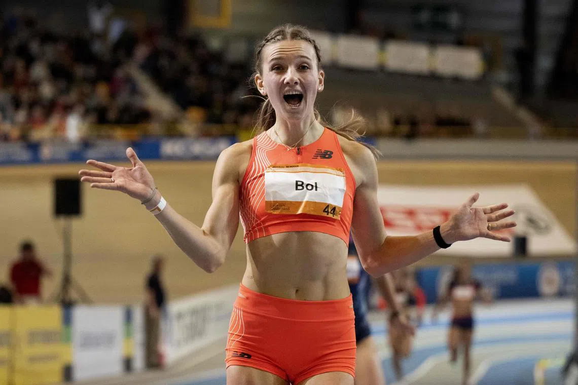 The Netherlands' Femke Bol celebrating after winning the women's 400m race and beating a 41-year-old world record during the Dutch national indoor championships in Apeldoorn on Sunday.