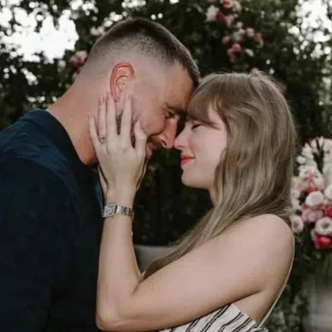 A screen (right) displays a message referencing Taylor Swift and Travis Kelce outside Madison Square Garden in New York on July 3. The pair’s love story began in 2023.