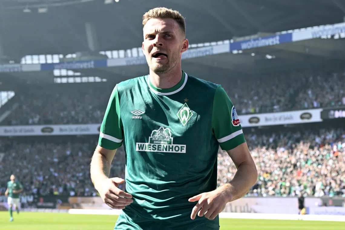 Soccer Football - 2. Bundesliga - Werder Bremen v Jahn Regensburg - Weser-Stadion, Bremen, Germany - May 15, 2022 Werder Bremen's Marvin Ducksch celebrates scoring their second goal REUTERS/Fabian Bimmer/ File Photo