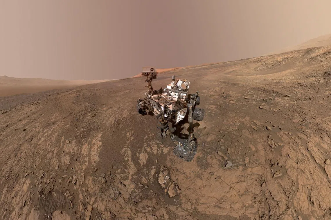 FILE PHOTO: A \"self-portrait\" of NASA's Curiosity Mars rover shows the vehicle on Vera Rubin Ridge on the planet Mars, which the rover has been investigating for the past several months, according to NASA, in this handout photo mosaic assembled from dozens of images taken January 23, 2018 and released January 31, 2018. NASA/Handout via REUTERS   ATTENTION EDITORS - THIS IMAGE WAS PROVIDED BY A THIRD PARTY/File Photo