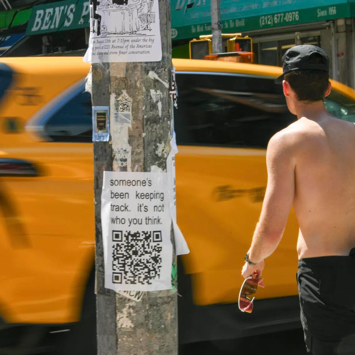 A flier on a pole in New York, Aug. 2, 2025. They’re not just for missing pets or yard sales. Fliers these days are for internet memes, self-promotion and extremely esoteric messages. (Dolly Faibyshev/The New York Times)