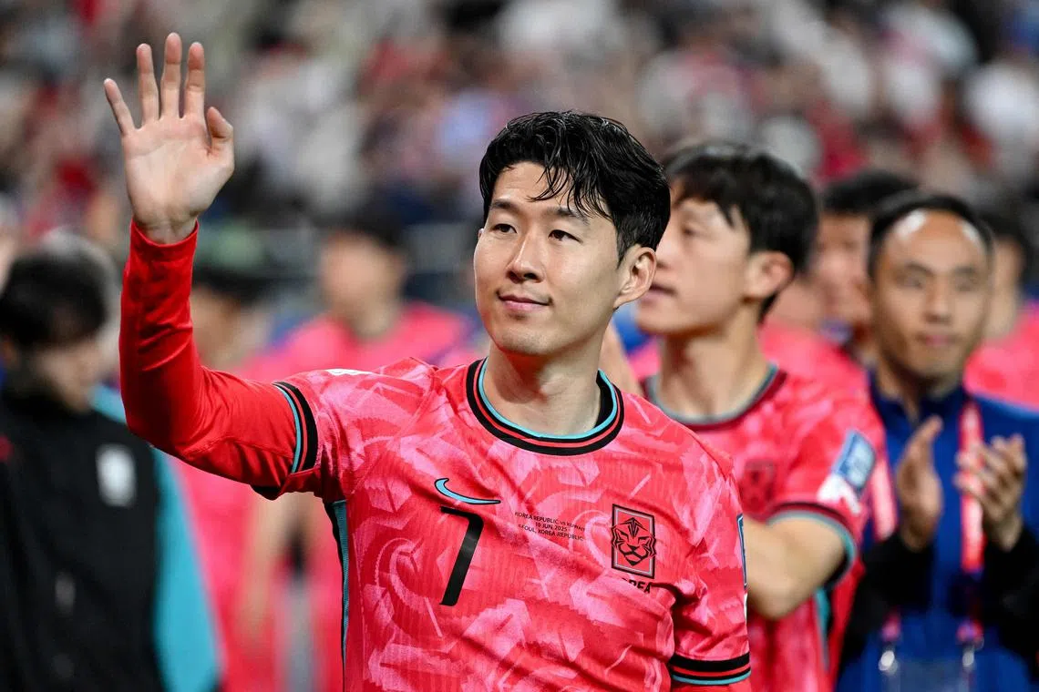 South Korea's Son Heung-min waves to fans after the team's win against Kuwait.