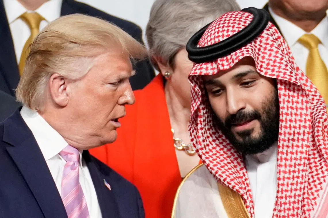 FILE PHOTO: U.S. President Donald Trump speaks with Saudi Arabia's Crown Prince Mohammed bin Salman at a G20 summit in Japan, June 28, 2019.  REUTERS/Kevin Lamarque/File Photo
