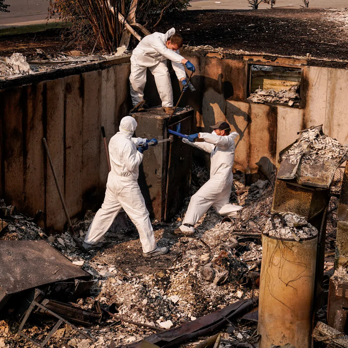 Over 64,000 people have been forced to evacuate the city, with residents doing what they can to salvage as much as possible.