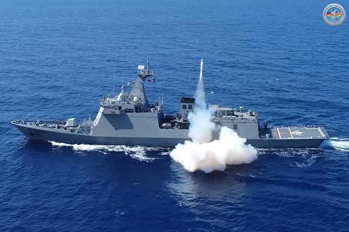 A Philippine frigate fires an anti-ship missile during a military exercise with US forces in the South China Sea.