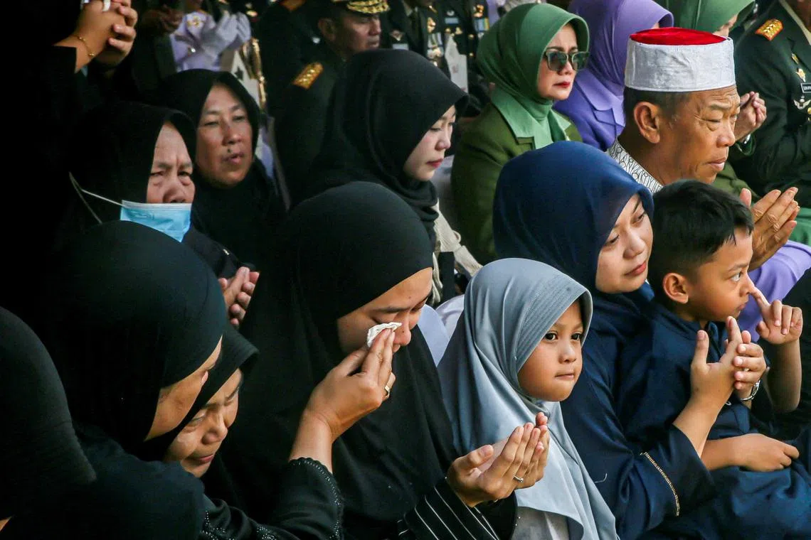 Relatives of Mr Zulmi Aditya Iskandar, a UNIFIL peacekeeper killed in Lebanon, attending his funeral at the Cikutra Heroes Cemetery in Bandung, West Java, Indonesia, on April 5.