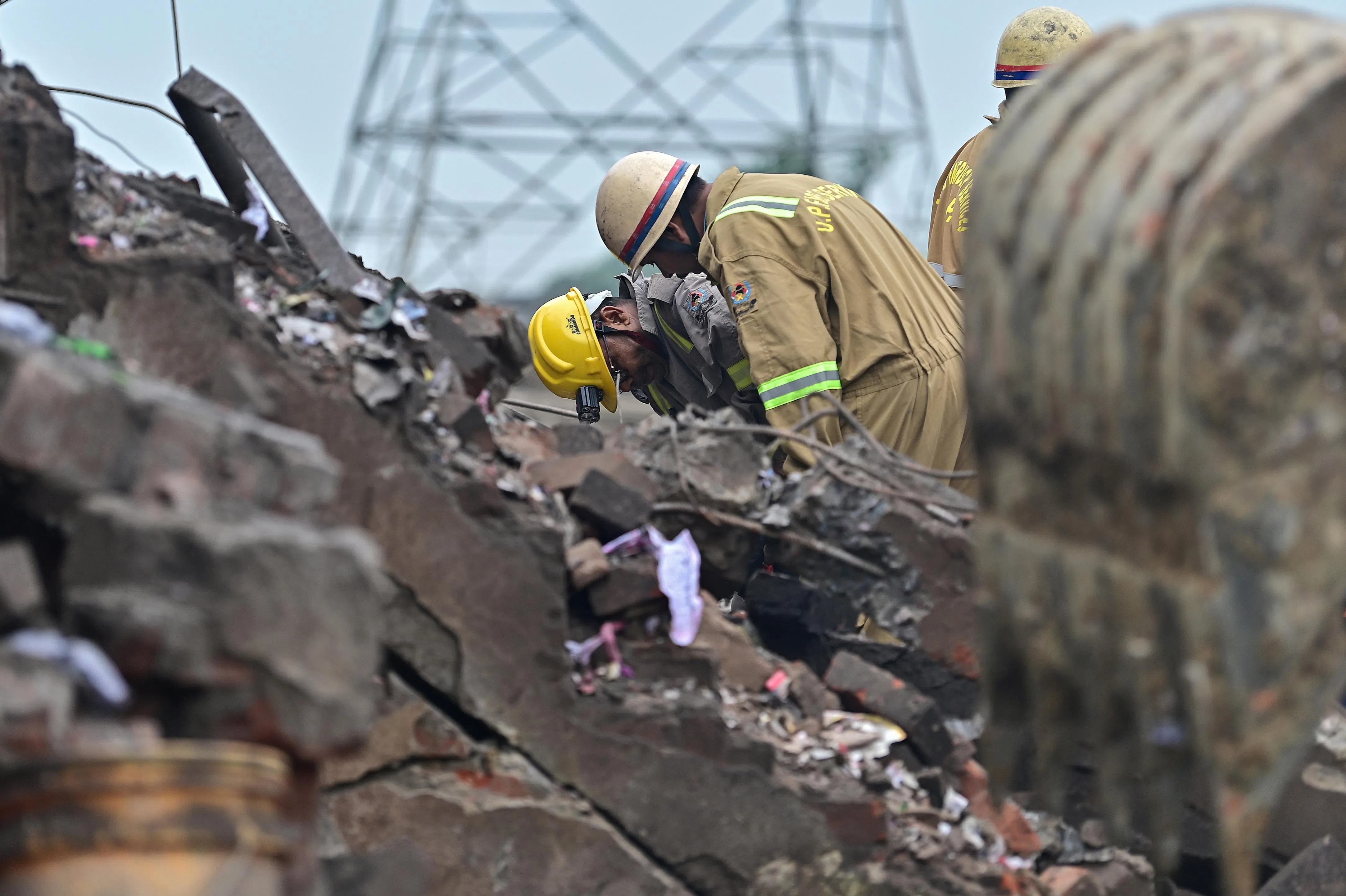 Rescue personnel working at the site of the explosion on Aug 31 in India’s Uttar Pradesh state.