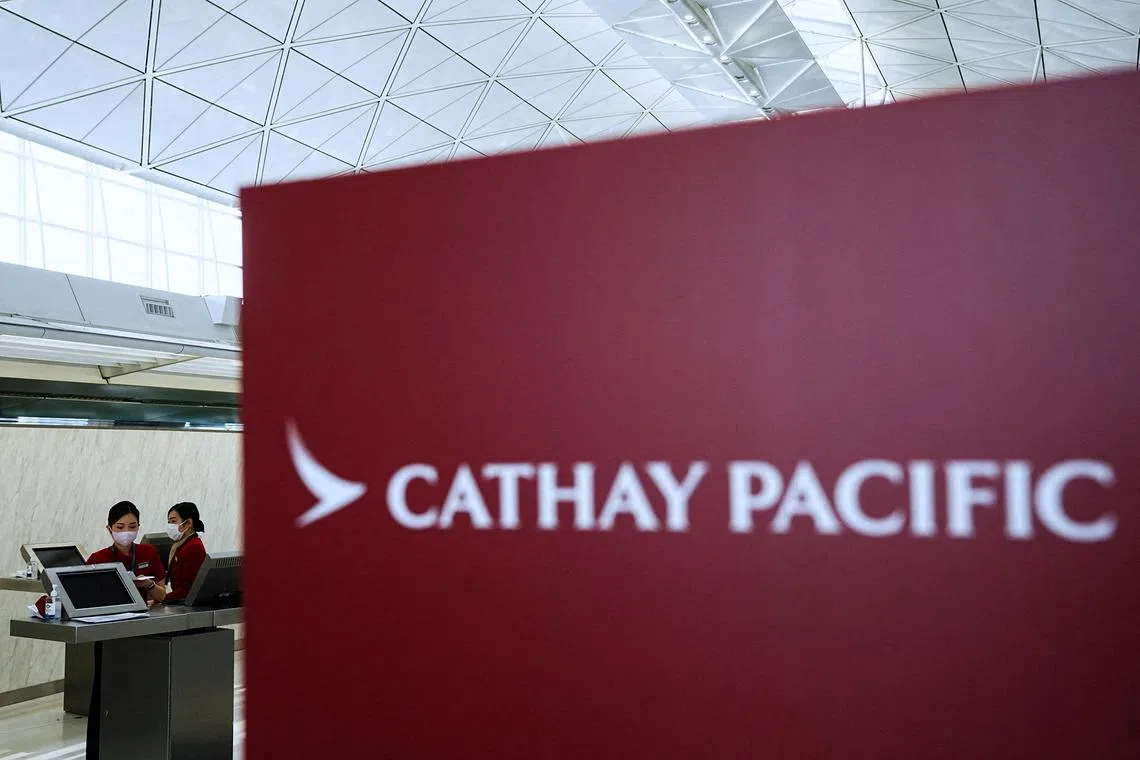 Cathay is axing 14 passenger flights on Dec 29, or around 11 per cent of its Hong Kong departures.