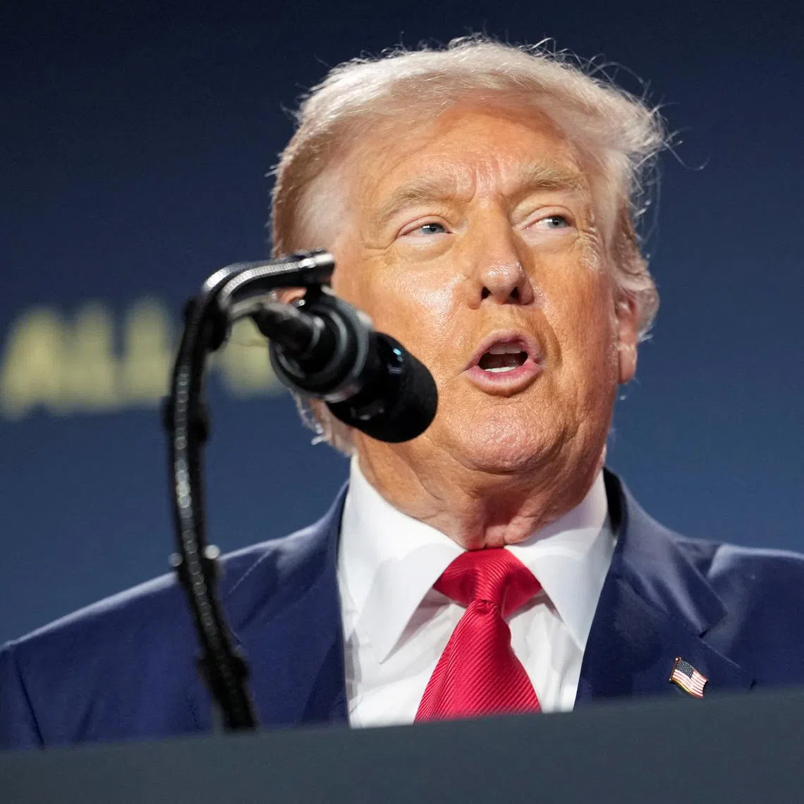 FILE PHOTO: U.S. President Donald Trump delivers remarks on artificial intelligence at the \"Winning the AI Race\" Summit in Washington D.C., U.S., July 23, 2025. REUTERS/Kent Nishimura/File Photo