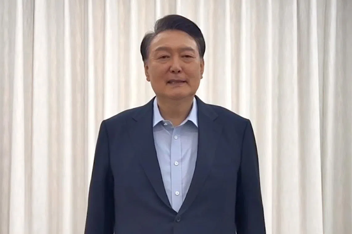 President Yoon Suk Yeol issues a statement at his official residence before heading toward the headquarters of the Corruption Investigation Office for High-ranking Officials at the government complex on Jan 15.