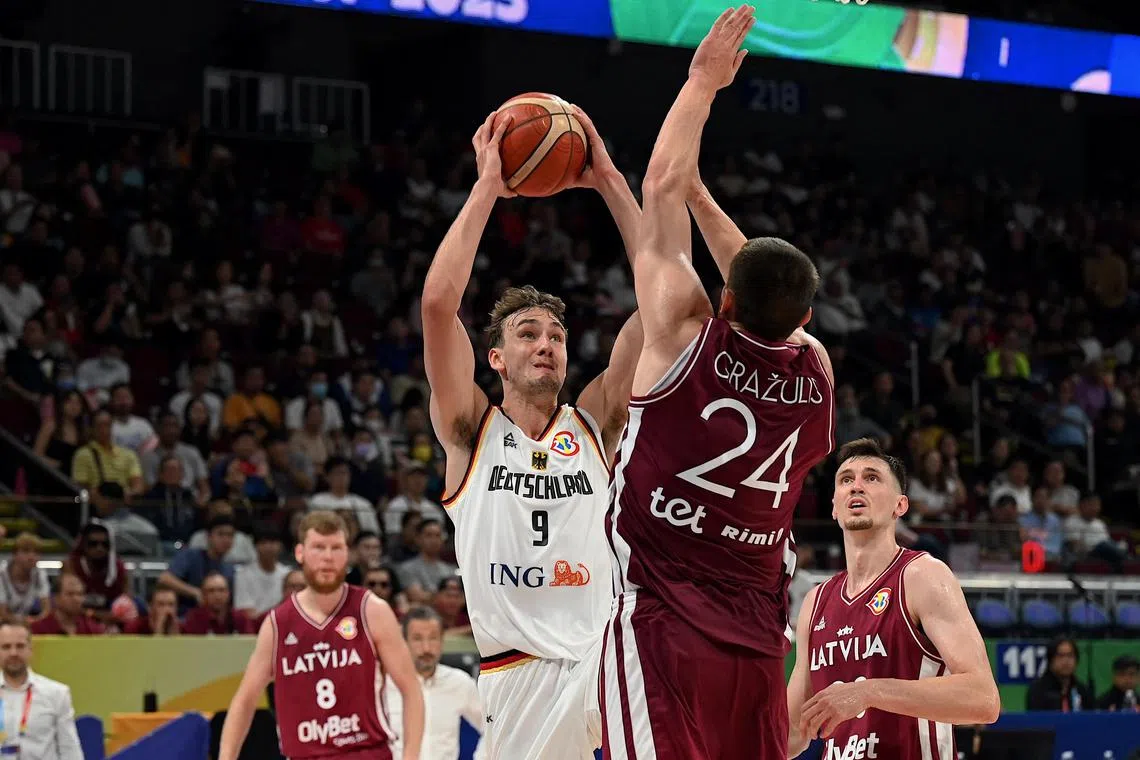 Germany's Franz Wagner shoots during the Basketball World Cup quarter-final clash against Latvia. The Germans won 81-79 after a tight battle.