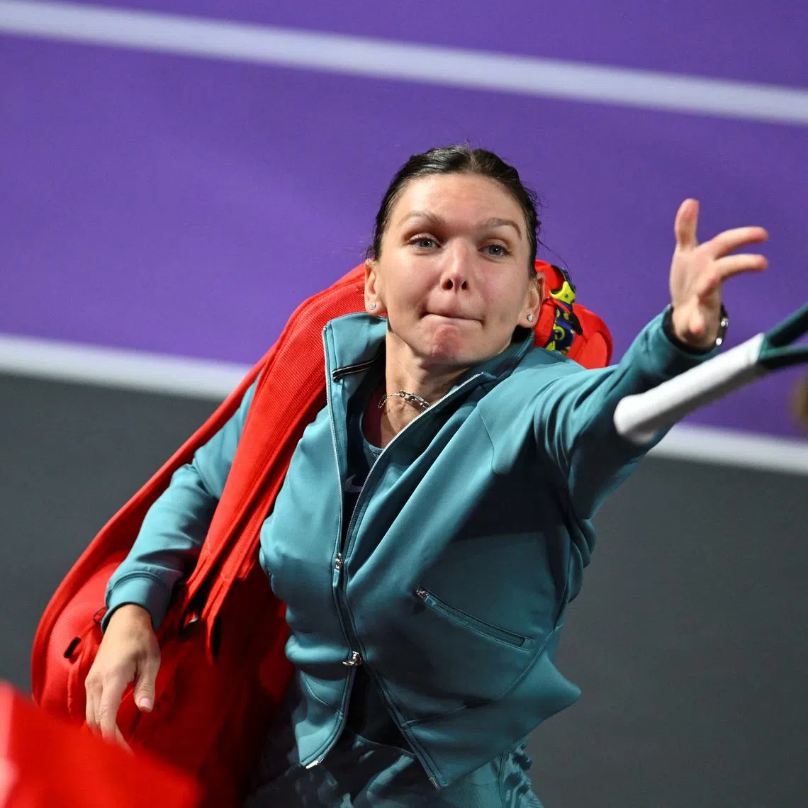 Simona Halep throws her racket to fans at the end of a match during Transylvania Open in Cluj-Napoca, Romania, February 4, 2024. Inquam Photos/Alex Nicodim via REUTERS