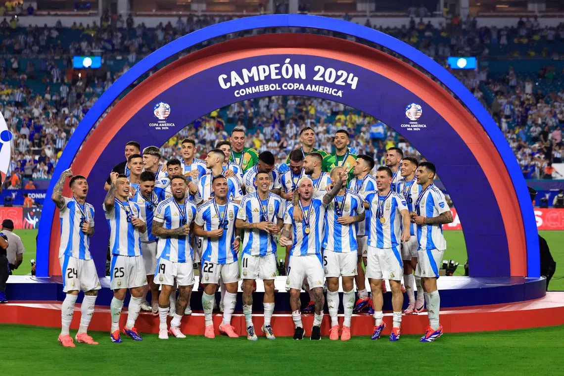 In the video, Argentina players were celebrating winning the Copa America (above).