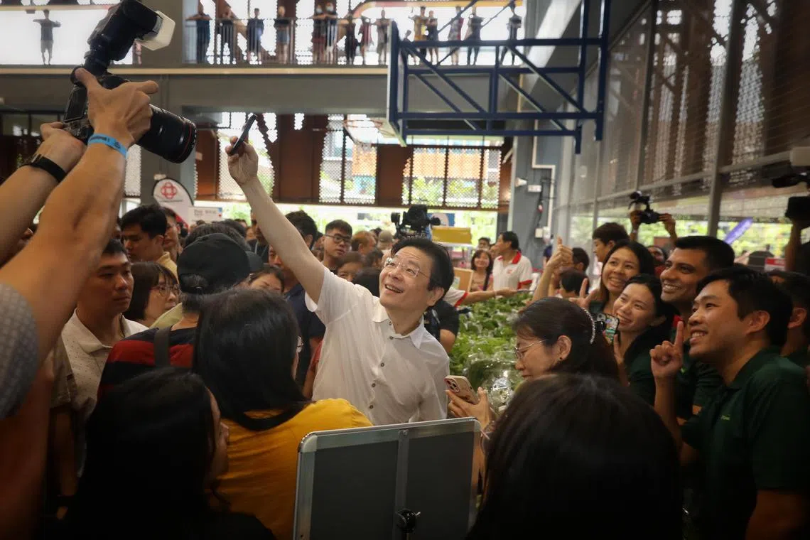 PM Lawrence Wong with residents at the official opening of Tengah Community Club on March 22.