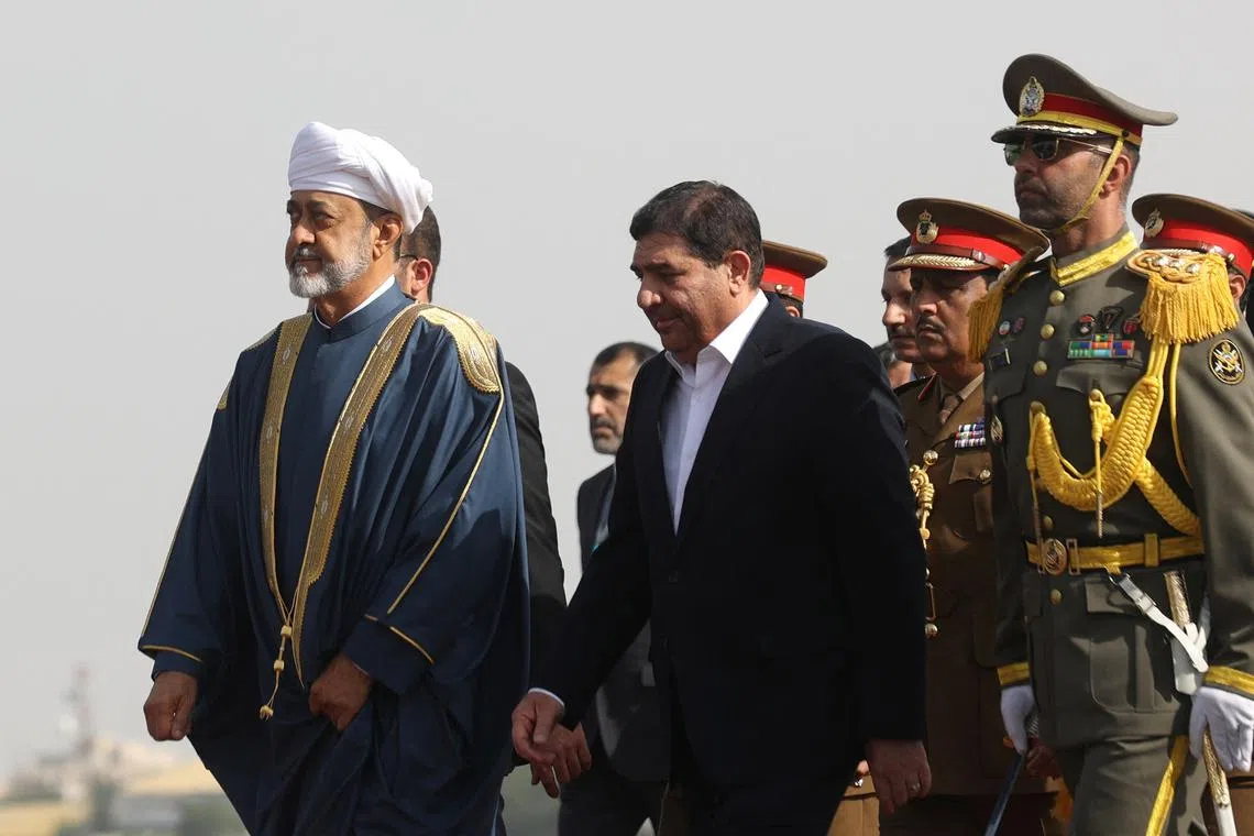 Iran's First Vice President Mohammad Mokhber welcomes Oman's Sultan Haitham bin Tariq upon his arrival at Mehrabad Airport in Tehran, Iran May 28, 2023.   Majid Asgaripour/WANA (West Asia News Agency) via REUTERS/File Photo