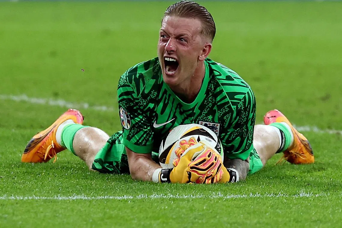 FILE PHOTO: Soccer Football - Euro 2024 - Round of 16 - England v Slovakia - Arena AufSchalke, Gelsenkirchen, Germany - June 30, 2024 England's Jordan Pickford reacts after collecting the ball in extra time REUTERS/Lee Smith/File Photo