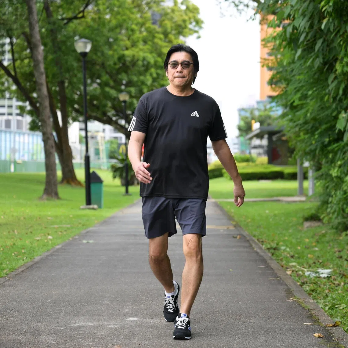 Mr New Boon Hwee, 57, lost weight through a year-long programme under NHG Polyclinics and achieved diabetes remission.