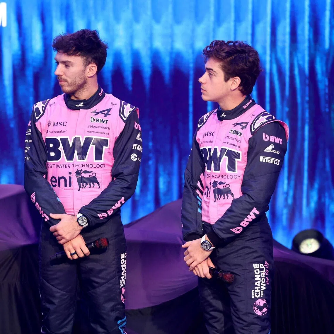 From left: Alpine's executive advisor Flavio Briatore, French driver Pierre Gasly and Argentinian driver Franco Colapinto talking on stage during the launch of the new car on Jan 23, 2026, in Barcelona.